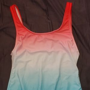 One piece bathing suit. High cut red white and blue ombre. Size M